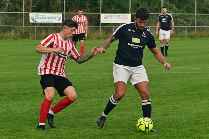 Eyes on the ball between Teigmouth AFC and Elburton Villa