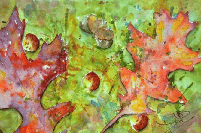 A painting using leaves and conkers 