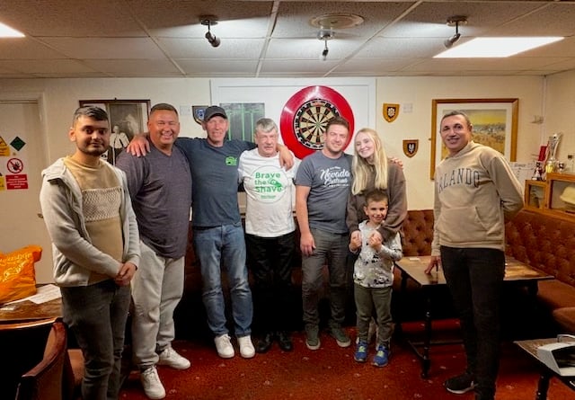 Glynn Smith surrounded by friends and family at the Royal British Legion in Kingsteignton including Erham Böke and Ali Yilmaz from Taji's, friends 'Sparky' and Tristan, son Zach, grandson, Lincoln, and his son's girlfriend Georgie.