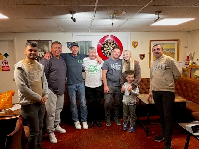 Glynn Smith surrounded by friends and family at the Royal British Legion in Kingsteignton including Erham Böke and Ali Yilmaz from Taji's, friends 'Sparky' and Tristan, son Zach, grandson, Lincoln, and his son's girlfriend Georgie.