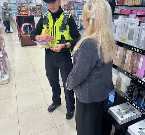 Police with Sharon Lobley from Austins department store 