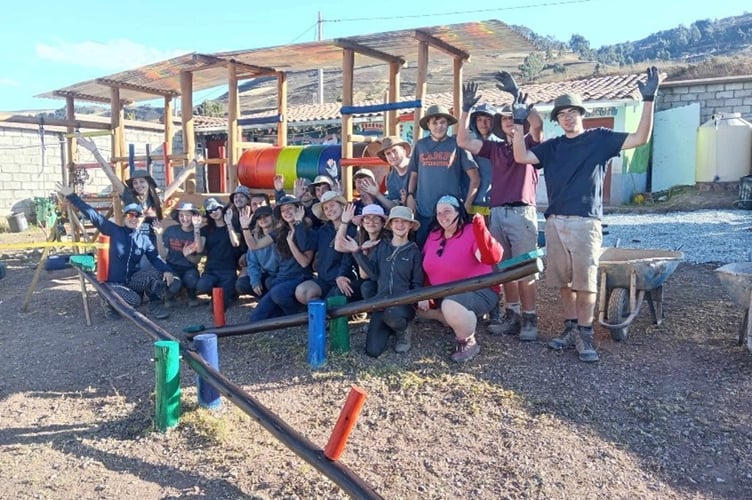 Students working during their Peru trek. 