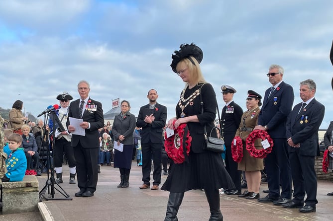 Teignmouth Mayor Councillor Cate Williams lays a wreath at the Cenotaph at the Teignmouth Remembrance Parade 2024