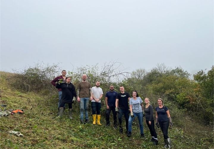 Nine volunteers from NGED spent a day helping boost the chances of a rare butterfly at the Barn Owl Trust reserve near Ashburton.