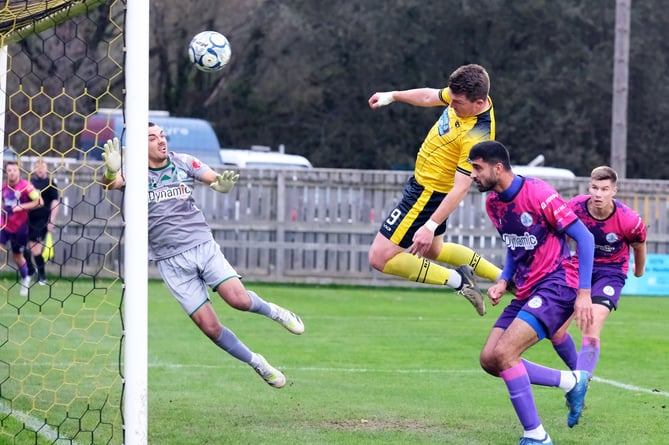 Ryan Bush heads home from close range against Clevedon