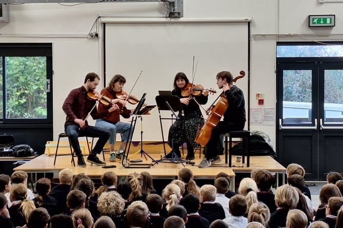 The Treske Quartet perform for youngsters at Canada Hill Primary School.