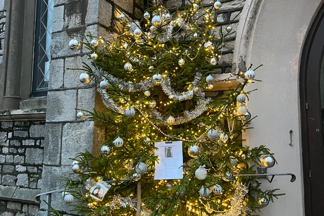 The illuminated Christmas Memorial Message Tree outside Teignmouth Methodist Church 