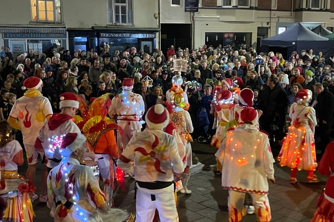 Samba band Street Heat entertained hundreds of revellers gathered in Teignmouth Triangle to watch the Christmas lights switch on 2024