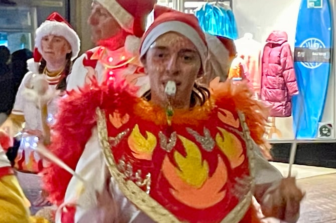 Samba band Street Heat brought a touch of colour, light and noise to the streets of Teignmouth ahead of the Christmas Lights Switch On 2024