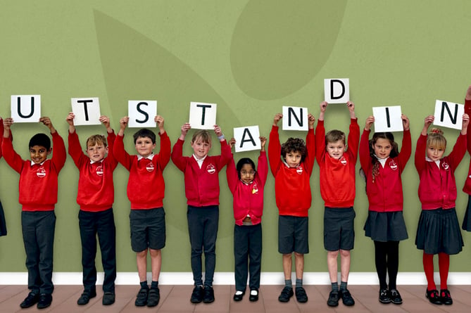 Shaldon Primary School pupils are certainly happy at having been graded as Outstanding