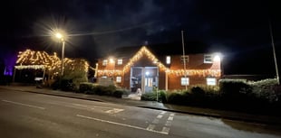 Carols around the Christmas tree