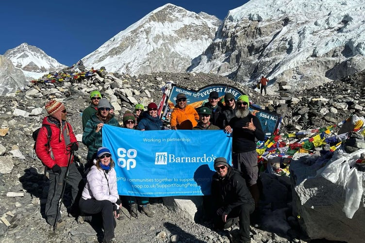 Ryan and his Coop collleagues at Everest Base Camp