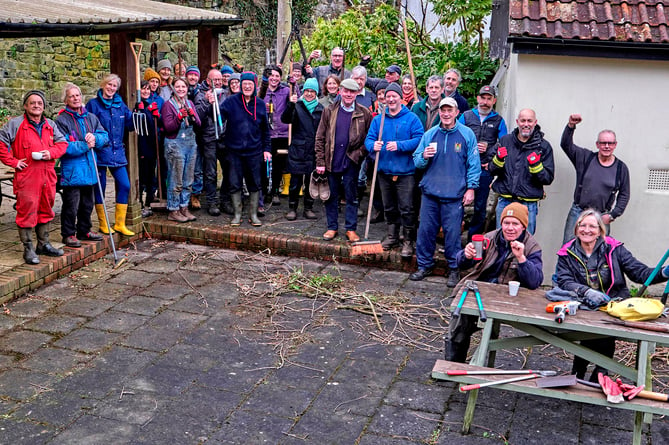 Something to celebrate - volunteers at the Drewe Arms have something else to say cheers to