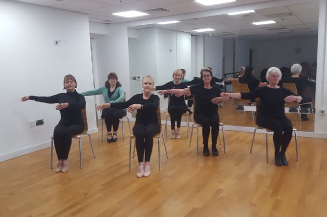 Seated swans chair dance