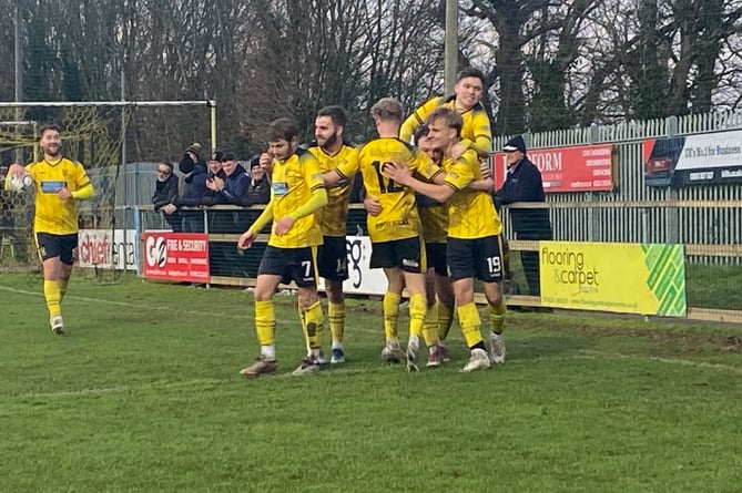 Buckland Athletic celebrate Will Hughes' debut goal