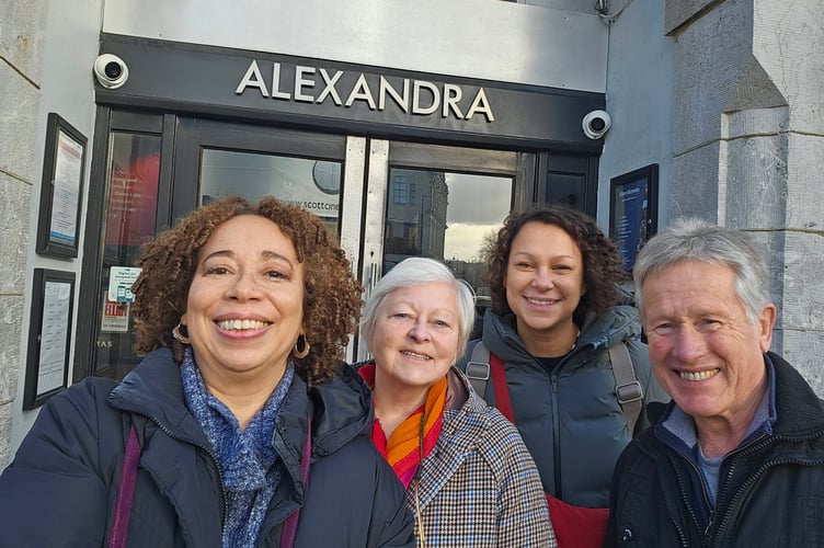 Dr Chamion Caballero, director of The Mixed Museum, Tess Walker, volunteer researcher at Newton Abbot Town and GWR Museum, Laura Smith, associate editorial director at The Mixed Museum, and Richard Ward, chair of the Newton Abbot and District Musical Comedy Society, outside the Alexandra Theatre in Newton Abbot. 