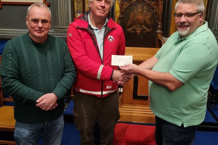 Pictured are Bro Derek Burtenshaw (Master Elect of Courtland Lodge), Alec Collyer MBE (Treasurer Dartmoor Rescue Group) and Mike Locke (Charity Steward of the Lodge). Photo Dartmoor Rescue Group 